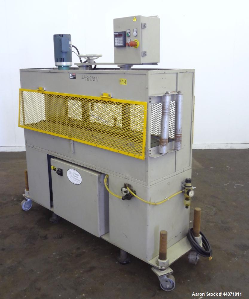 Used Michigan Plastics Machinery Puller.  (2) 5-1/2" Wide x 49" long contact cleated rubber belts.  Manually adjustable approximately 10" belt opening.  Each belt driven by a 1.5 hp, 3/60/208-230/460...