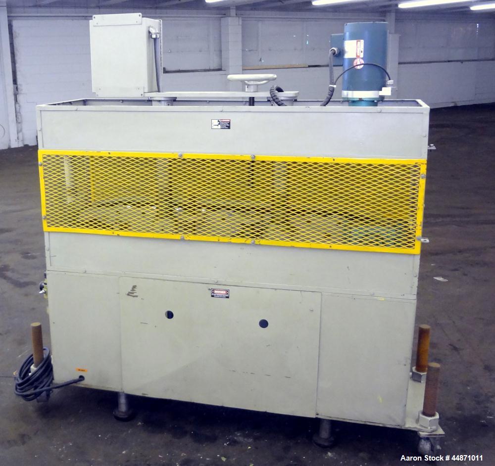 Used Michigan Plastics Machinery Puller.  (2) 5-1/2" Wide x 49" long contact cleated rubber belts.  Manually adjustable approximately 10" belt opening.  Each belt driven by a 1.5 hp, 3/60/208-230/460...