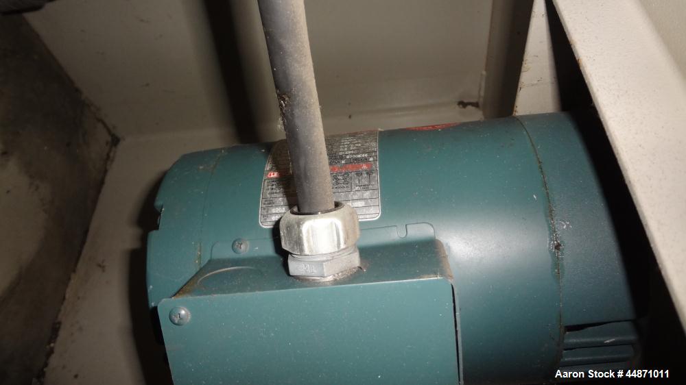 Used Michigan Plastics Machinery Puller.  (2) 5-1/2" Wide x 49" long contact cleated rubber belts.  Manually adjustable approximately 10" belt opening.  Each belt driven by a 1.5 hp, 3/60/208-230/460...