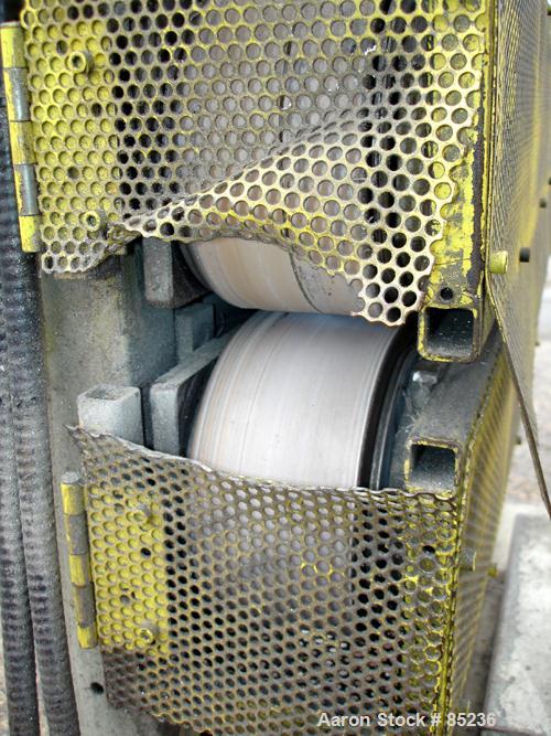 Used Metaplast Puller, Model PB4C. (2) 3.5" wide x 26" long contact area, manually adjustable rubber belts. Driven by a 2 HP DC gearmotor. Approximately 7 to 72 feet per minute.