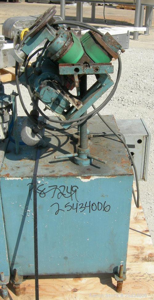 Used-  Puller, "V" Shaped.  (2)  1 3/4" wide x 12" long belts.  Manually adjustable height. Driven by a  3/4 hp, 90 volt, 25...