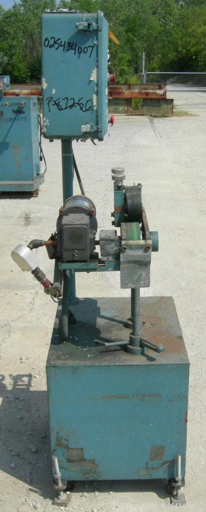 Used-  Puller, 2" wide x 12" long bottom belt.  (2) 4" diameter x 2" wide top rubber rolls.  Manually adjustable.  Driven by...