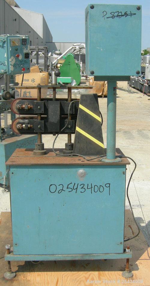 Used Puller, (2) 3" wide x 22" long belts.  Manually adjustable height.  Driven by a 1/2 hp, 90 volt, 1750 rpm DC gearmotor.