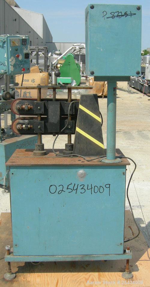 Used-  Puller, (2) 3" wide x 22" long belts.  Manually adjustable height.  Driven by a 1/2 hp, 90 volt, 1750 rpm DC gearmoto...