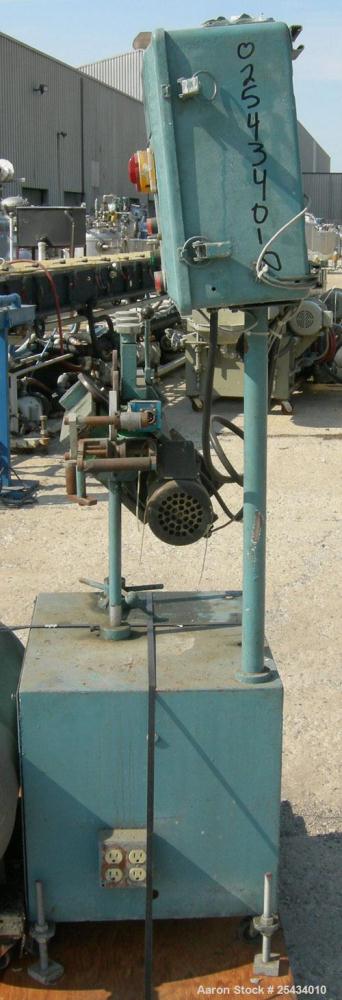 Used-  Puller, "V" Shaped.  (2)  2" wide x 12" long belts.  Manually adjustable height.  Driven by a 1/2 hp, 90 volt, 1725 r...