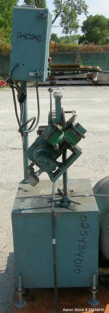 Used-  Puller, "V" Shaped.  (2)  2" wide x 12" long belts.  Manually adjustable height.  Driven by a 1/2 hp, 90 volt, 1725 r...