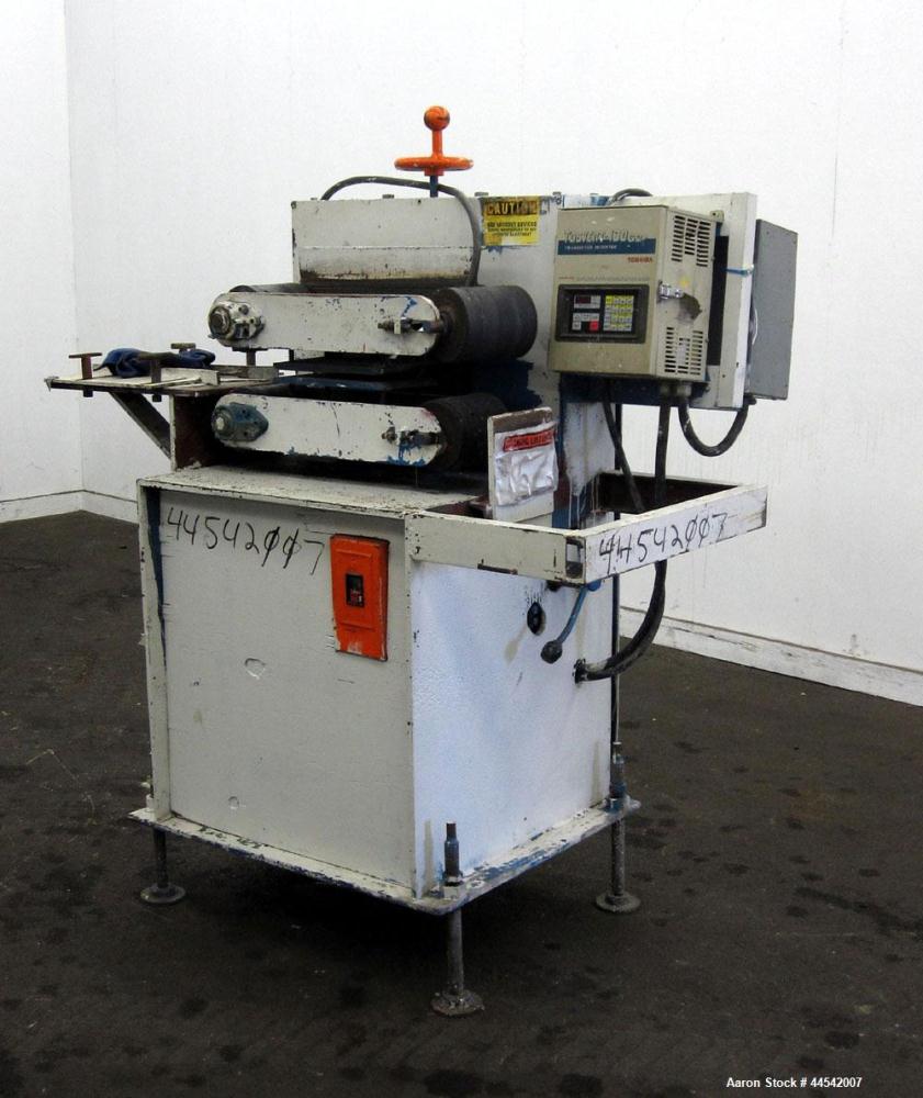 Used Belt Puller. Requires (2) approximately 6” wide x 22” long contact area belts, manually adjustable, approximately 6” maximum daylight. Driven by a 1.5 hp, 3/60/230/460 volt, 3460 rpm motor. Incl...