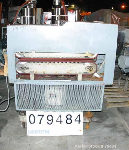 Used Belt Puller. 6" wide x 36" contact area. Manually adjustable rubber belts, approximately 7" daylight. Driven by a 1.5 HP, 3/60/230/460 Volt, 1725 RPM gearmotor. Unit includes a Reliance SP500 dr...