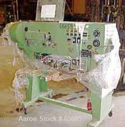 USED: Picard puller/cutter, type PST25R. 1.5" wide x 11" st side,belt driven by a 0.56 hp/0.37 kw-150/200 volt/50 cycle/3 ph motor,on 4 wheels.