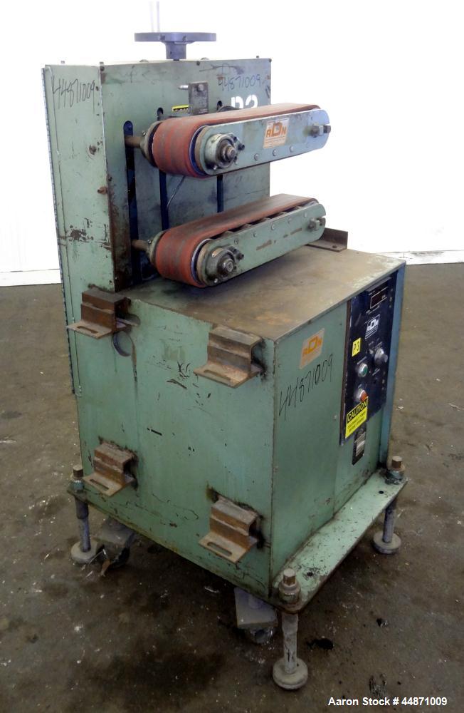 Used RDN Belt Puller, Model 118-5.  (2) Approximately 3.75" wide x 18" long contact area belts, manually adjustable, approximately 5" maximum daylight. Capacity up to 4" diameter product. Driven by a...