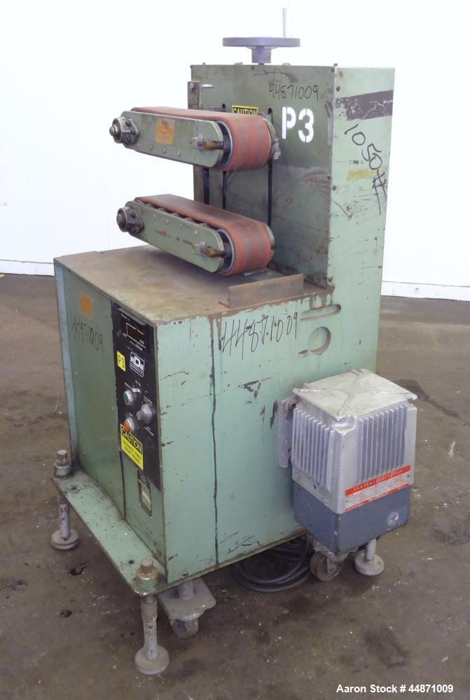 Used RDN Belt Puller, Model 118-5.  (2) Approximately 3.75" wide x 18" long contact area belts, manually adjustable, approximately 5" maximum daylight. Capacity up to 4" diameter product. Driven by a...