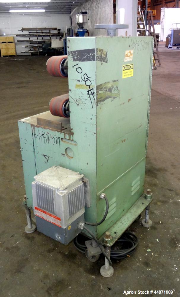 Used RDN Belt Puller, Model 118-5.  (2) Approximately 3.75" wide x 18" long contact area belts, manually adjustable, approximately 5" maximum daylight. Capacity up to 4" diameter product. Driven by a...