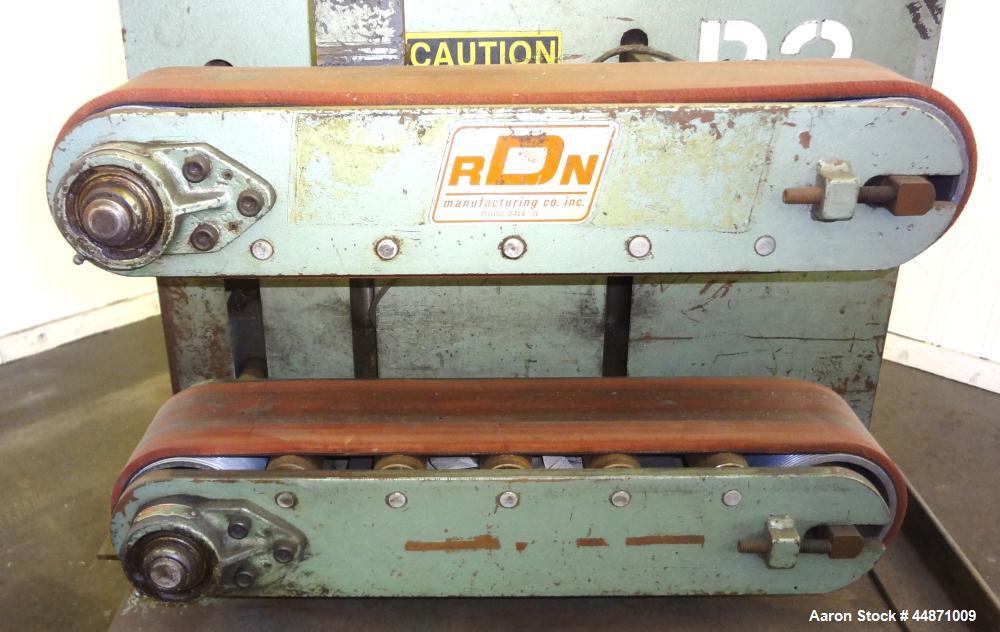 Used RDN Belt Puller, Model 118-5.  (2) Approximately 3.75" wide x 18" long contact area belts, manually adjustable, approximately 5" maximum daylight. Capacity up to 4" diameter product. Driven by a...