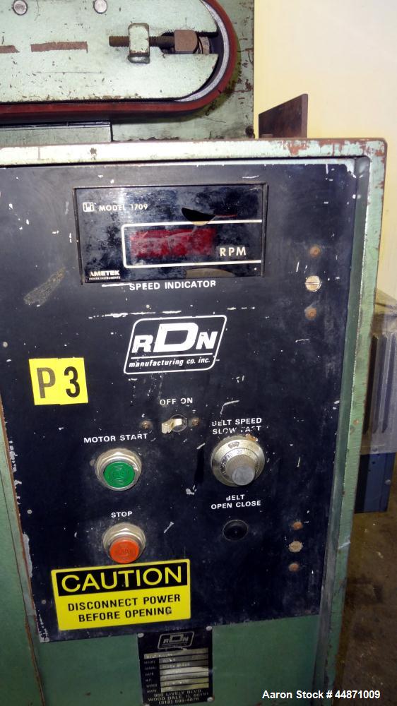 Used RDN Belt Puller, Model 118-5.  (2) Approximately 3.75" wide x 18" long contact area belts, manually adjustable, approximately 5" maximum daylight. Capacity up to 4" diameter product. Driven by a...