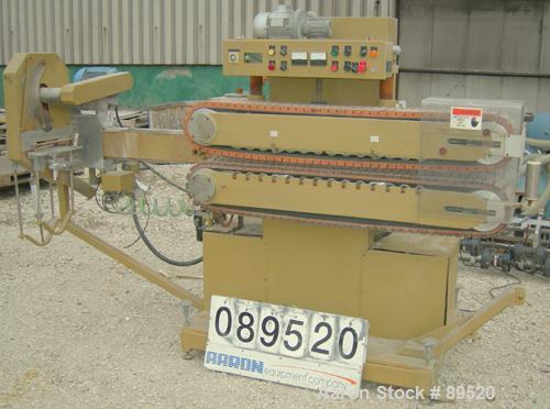 USED: Royal Machine cleated belt puller/cutter, model 055. (2) 7-1/2" wide x 58" long contact area belts, driven by an approximate 2 hp motor; (1) chop saw, approximate 14" diameter blade, driven by ...