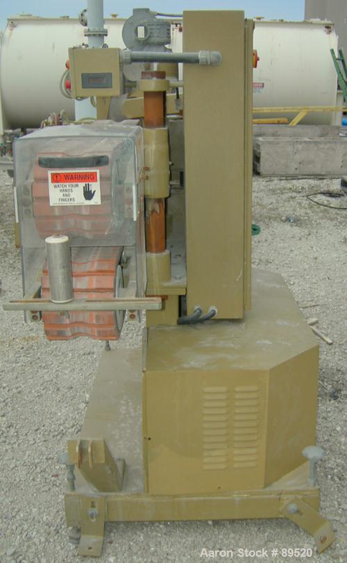 USED: Royal Machine cleated belt puller/cutter, model 055. (2) 7-1/2" wide x 58" long contact area belts, driven by an approximate 2 hp motor; (1) chop saw, approximate 14" diameter blade, driven by ...