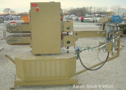USED: Royal Machine cleated belt puller/cutter, model 055. (2) 7-1/2" wide x 58" long contact area belts, driven by an approximate 2 hp motor; (1) chop saw, approximate 14" diameter blade, driven by ...