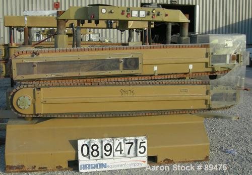 USED: Becz Machine belt puller, model 056. (2) 8" wide x 8' long contact area. Top belt motorized adjustment, bottom belt manually adjustable. Driven by an approximate 5 hp motor. Includes control pa...