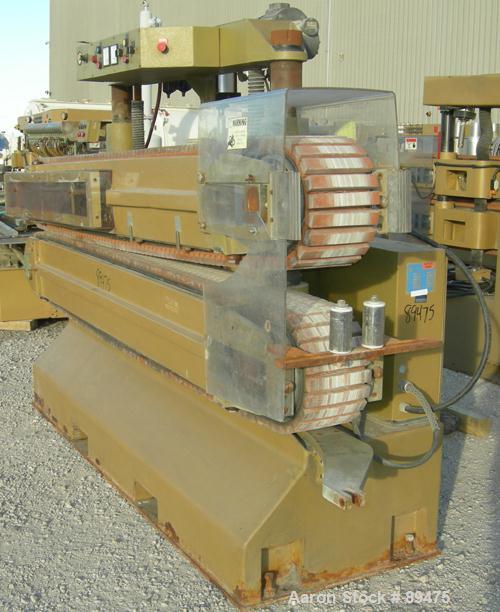 USED: Becz Machine belt puller, model 056. (2) 8" wide x 8' long contact area. Top belt motorized adjustment, bottom belt manually adjustable. Driven by an approximate 5 hp motor. Includes control pa...