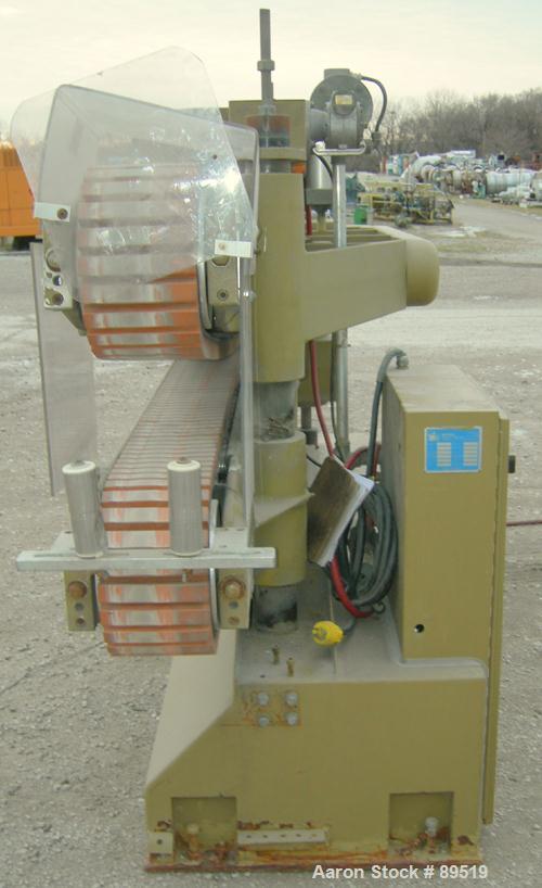 USED: Royal Machine belt puller, model 056. (2) 8" wide x 8' long contact areas. Top belt motorized adjustment, bottom belt manually adjustable. Driven by an approximate 5 hp motor. Includes control ...
