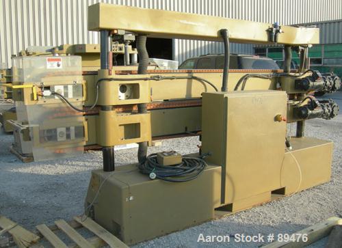 USED: Royal Machine cleated belt puller, model 067. (2) 10" wide x 12' long contact area. Pneumatically adjustable belts. Each belt driven by a 2 hp, 230/460 volt, 1750 rpm  gearmotor. Includes contr...