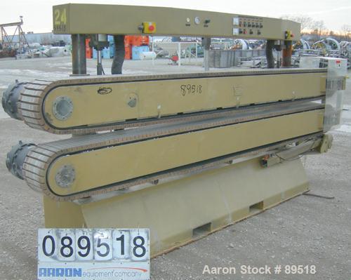 USED: Royal Machine cleated belt puller, model 067. (2) 10" wide x 12' long contact areas. Pneumatically adjustable belts. Each belt driven by a 2 hp, 640 volt, 2500 rpm DC gearmotor. Includes contro...