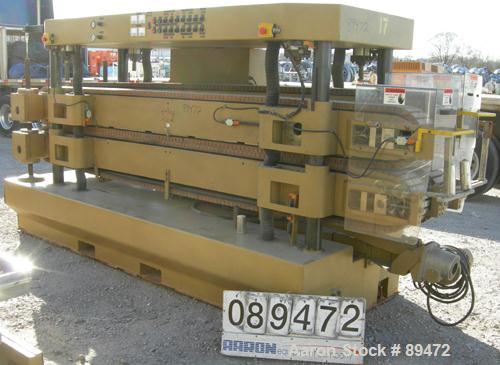 USED: Royal Machine dual lane cleated belt puller, model 069. (2) Lanes each with (2) 8" wide x 12' long contact area. Pneumatically adjustable belts. Driven by an approximate 15 hp motor. Includes c...