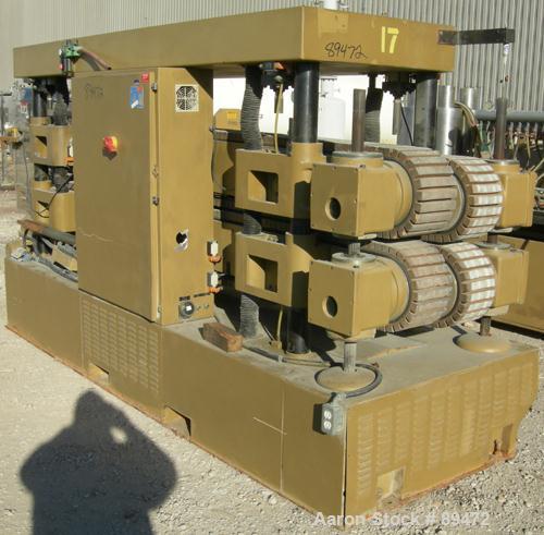 USED: Royal Machine dual lane cleated belt puller, model 069. (2) Lanes each with (2) 8" wide x 12' long contact area. Pneumatically adjustable belts. Driven by an approximate 15 hp motor. Includes c...