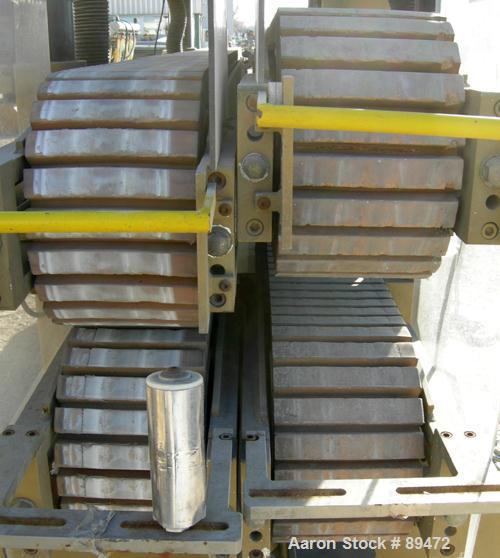 USED: Royal Machine dual lane cleated belt puller, model 069. (2) Lanes each with (2) 8" wide x 12' long contact area. Pneumatically adjustable belts. Driven by an approximate 15 hp motor. Includes c...