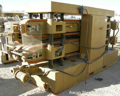USED: Royal Machine dual lane cleated belt puller, model 069. (2) Lanes each with (2) 8" wide x 12' long contact area. Pneumatically adjustable belts. Driven by an approximate 15 hp motor. Includes c...