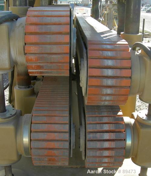 USED: Royal Machine dual lane cleated belt puller, model 069. (2) Lanes each with (2) 8" wide x 12' long contact area. Pneumatically adjustable belts. Driven by an approximate 15 hp motor. Includes c...