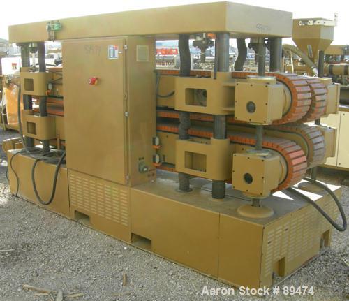 USED: Royal Machine dual lane cleated belt puller, model 069. (2) Lanes each with (2) 8" wide x 12' long contact area. Pneumatically adjustable belts. Driven by an approximate 15 hp motor. Includes c...