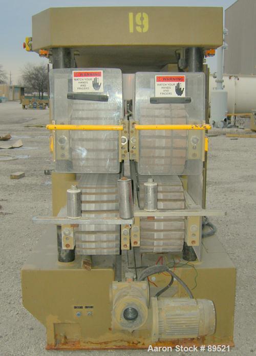 USED: Royal Machine dual lane cleated belt puller, model 069. (2) Lanes each with (2) 8" wide x 12' long contact area. Pneumatically adjustable belts. Driven by an approximate 15 hp motor. Includes c...
