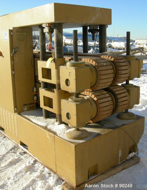 USED: Royal Machine dual lane cleated belt puller, model 069. (2) Lanes each with (2) 8" wide x 12' long contact area. Pneumatically adjustable belts. Driven by an approximate 15 hp motor. Includes c...