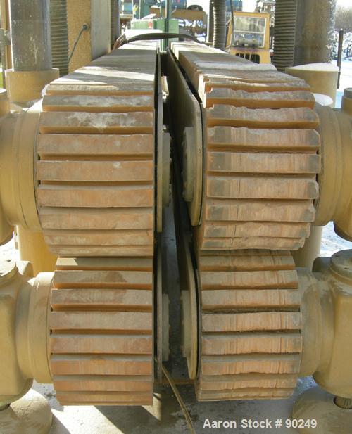 USED: Royal Machine dual lane cleated belt puller, model 069. (2) Lanes each with (2) 8" wide x 12' long contact area. Pneumatically adjustable belts. Driven by an approximate 15 hp motor. Includes c...