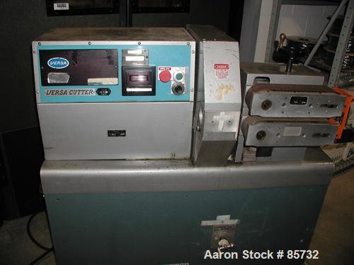 USED: Versa puller/cutter machine consisting of: (1) Versa puller, model C22, serial #22358, (2) 2" wide x 11" contact length manually adjustable rubber belts, approx 2-1/4" daylight. (1) Versa cutte...