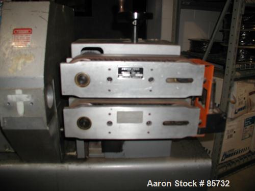 USED: Versa puller/cutter machine consisting of: (1) Versa puller, model C22, serial #22358, (2) 2" wide x 11" contact length manually adjustable rubber belts, approx 2-1/4" daylight. (1) Versa cutte...