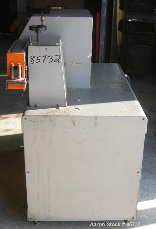 USED: Versa puller/cutter machine consisting of: (1) Versa puller, model C22, serial #22358, (2) 2" wide x 11" contact length manually adjustable rubber belts, approx 2-1/4" daylight. (1) Versa cutte...