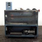 Used Boston Matthews Cleated Belt Puller, Model CWL-600-VT. (2) Approximately 4” wide x 42” long contact area belts, manually adjustable, take off speed range 1 to 60 feet per minute. Driven by a 3 h...