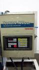 Used Belt Puller. Requires (2) approximately 6” wide x 22” long contact area belts, manually adjustable, approximately 6” maximum daylight. Driven by a 1.5 hp, 3/60/230/460 volt, 3460 rpm motor. Incl...