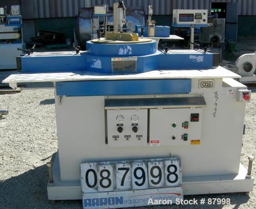 Used Custom Downstream Systems Upacting Traveling Miter Saw, Model CTMS-6.5-13. Approximately 14" diameter blade, pneumatically adjustable top clamp. Can be set to 15, 30 and 45 degree angles. Driven...