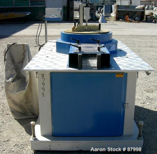 Used Custom Downstream Systems Upacting Traveling Miter Saw, Model CTMS-6.5-13. Approximately 14" diameter blade, pneumatically adjustable top clamp. Can be set to 15, 30 and 45 degree angles. Driven...