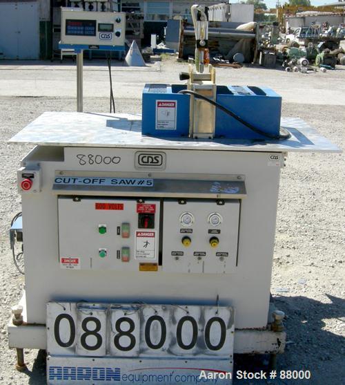 Used Custom Downstream Systems Upacting Traveling Miter Saw, Model CTS-6.5-13. Approximately 14" diameter blade, pneumatically adjustable top clamp. Can be set to 15, 30 and 45 degree angles. Driven ...