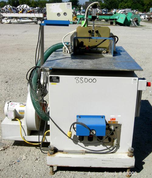 Used Custom Downstream Systems Upacting Traveling Miter Saw, Model CTS-6.5-13. Approximately 14" diameter blade, pneumatically adjustable top clamp. Can be set to 15, 30 and 45 degree angles. Driven ...