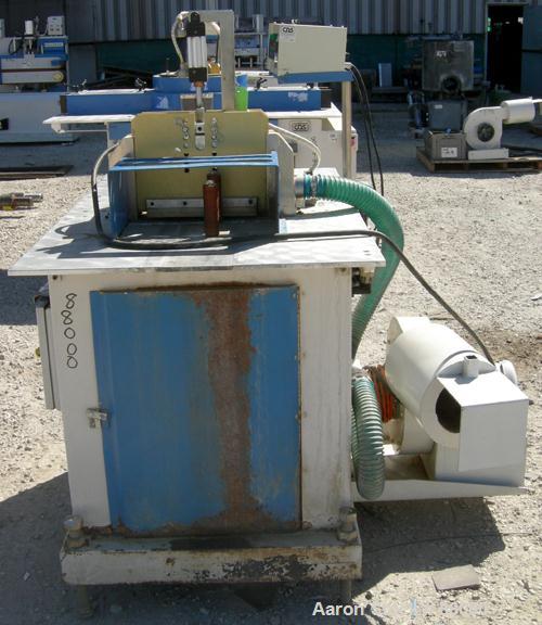 Used Custom Downstream Systems Upacting Traveling Miter Saw, Model CTS-6.5-13. Approximately 14" diameter blade, pneumatically adjustable top clamp. Can be set to 15, 30 and 45 degree angles. Driven ...