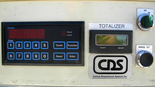 Used Custom Downstream Systems Upacting Traveling Miter Saw, Model CTS-6.5-13. Approximately 14" diameter blade, pneumatically adjustable top clamp. Can be set to 15, 30 and 45 degree angles. Driven ...