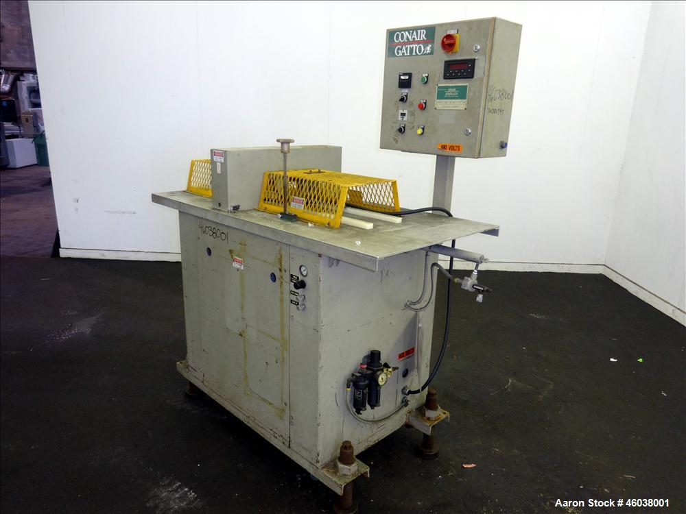 Used Conair Jetro Gatto Cut-Off Saw, Model UC-4-18. Approximate 16" diameter cutting blade. 18" Travel, 4-1/2" O.D. capacity with a 25" maximum cut length. Driven by a 1hp, 3/60/208-230/460 volt, 345...
