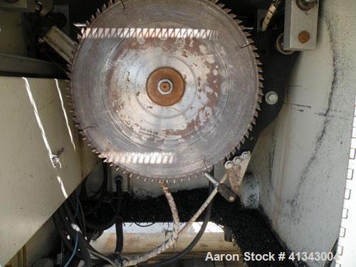 Used Conair Air Traveling Cut Off Saw, model MST6-L. 18" diameter up acting blade, traveling table. Top air operated hold down. Driven by a 3 hp, 3/60/208-230/460 volt, 1745 rpm motor. Includes a M60...