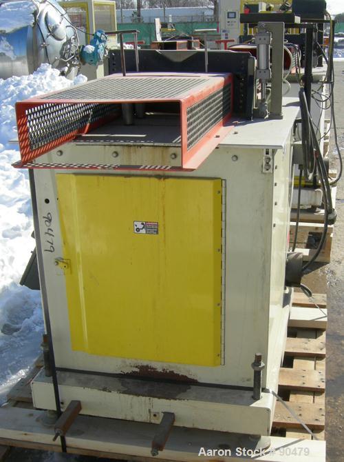 USED: Conair traveling cut off saw, model MST-6. Upacting saw blade. Approximate 32" x 52" traveling table. Top air operated hold down. Driven by an approximate 3 hp motor. Includes a dust collector ...