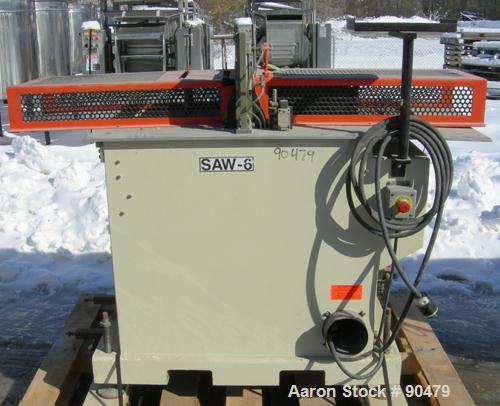 USED: Conair traveling cut off saw, model MST-6. Upacting saw blade. Approximate 32" x 52" traveling table. Top air operated hold down. Driven by an approximate 3 hp motor. Includes a dust collector ...